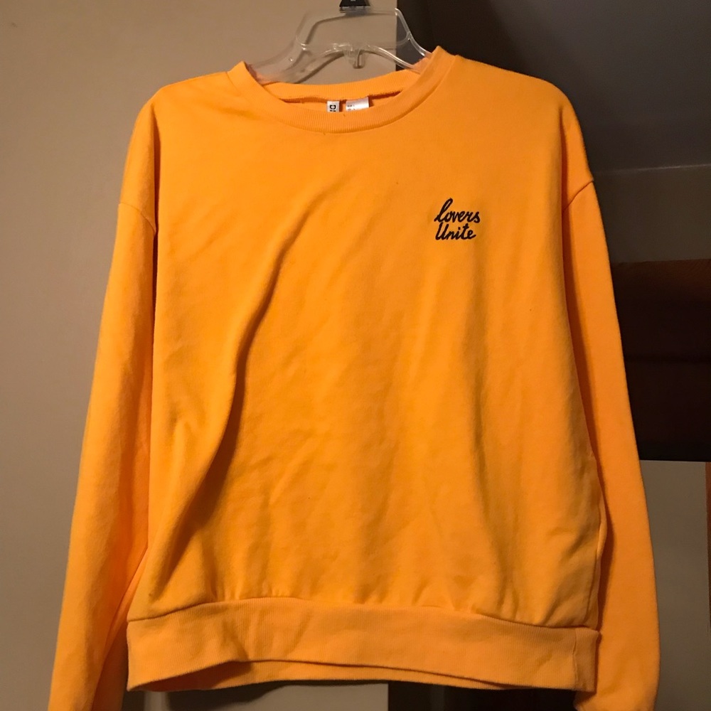 yellow sweatshirt